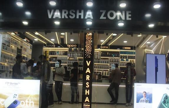 𝗩𝗮𝗿𝘀𝗵𝗮 𝗭𝗼𝗻𝗲 || Best Mobile Shop In Ujjain | Tablet Accessories Shop In Ujjain | Mobile Accessories Shop In Ujjain logo